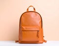 Stylish orange backpack on light background, top view. Space for text Royalty Free Stock Photo