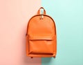 Stylish orange backpack on light background, top view. Space for text Royalty Free Stock Photo