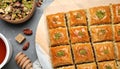 Delicious sweet baklava with nuts and honey on table, flat lay Royalty Free Stock Photo