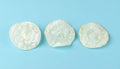 Three Thick-Cut Sea Salt Kettle Chips Side by Side on Pastel Blue Matte Background Royalty Free Stock Photo
