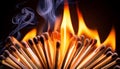 A row of wooden matches on fire Royalty Free Stock Photo