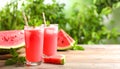Delicious fresh watermelon drink on wooden table. Space for text Royalty Free Stock Photo