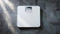 A white analog bathroom scale Royalty Free Stock Photo