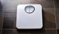 A white analog bathroom scale Royalty Free Stock Photo