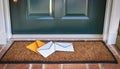 Several white envelopes are scattered on a brown coir doormat Royalty Free Stock Photo