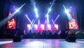 Empty festival stage with bright spotlights and colorful backdrops Royalty Free Stock Photo