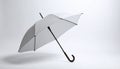 Open umbrella blown by wind gust on white background Royalty Free Stock Photo