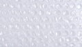 generated using AI.Clear bubble wrap sheet with evenly spaced air-filled pockets. Royalty Free Stock Photo