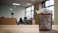 Wastebasket filled with crumpled paper Royalty Free Stock Photo