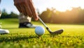 Person playing golf on green course, closeup Royalty Free Stock Photo