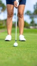 Person playing golf on green course, closeup Royalty Free Stock Photo