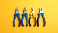 Combination pliers on color background, top view Royalty Free Stock Photo