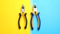 Combination pliers on color background, top view Royalty Free Stock Photo