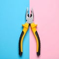 Combination pliers on color background, top view Royalty Free Stock Photo