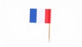 Small paper flag of France isolated on white Royalty Free Stock Photo