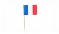 Small paper flag of France isolated on white Royalty Free Stock Photo