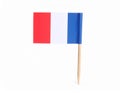Small paper flag of France isolated on white Royalty Free Stock Photo