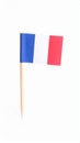 Small paper flag of France isolated on white Royalty Free Stock Photo