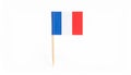 Small paper flag of France isolated on white Royalty Free Stock Photo