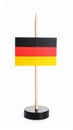 Small paper flag of Germany isolated on white Royalty Free Stock Photo