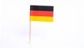 Small paper flag of Germany isolated on white Royalty Free Stock Photo