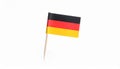 Small paper flag of Germany isolated on white Royalty Free Stock Photo