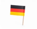 Small paper flag of Germany isolated on white Royalty Free Stock Photo