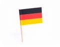 Small paper flag of Germany isolated on white Royalty Free Stock Photo