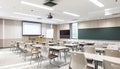 Modern Classroom with Digital Projector, Smartboard, and Neatly Aligned Chairs in Soft Neutral Tones Royalty Free Stock Photo