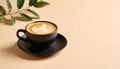 Cappuccino in Matte Black Cup on Soft Beige-to-Pale Yellow Gradient Royalty Free Stock Photo