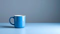 Minimalist Mug of Coffee on Blue to Gray Gradient Background Royalty Free Stock Photo