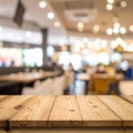Empty wooden table in the restaurant, design space Royalty Free Stock Photo