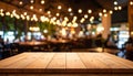Empty wooden table in the restaurant, design space Royalty Free Stock Photo
