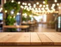 Empty wooden table in the restaurant, design space Royalty Free Stock Photo