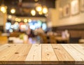 Empty wooden table in the restaurant, design space Royalty Free Stock Photo