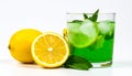 Fresh juicy lemons and a green drink on a white background. Royalty Free Stock Photo