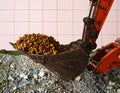 Excavator Bucket Full of Expanded Clay Aggregate (LECA) Royalty Free Stock Photo
