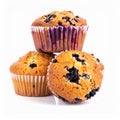 Delicious blueberry muffins stacked on a white background. Royalty Free Stock Photo