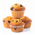 Delicious blueberry muffins stacked on a white background. Royalty Free Stock Photo