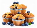 Delicious blueberry muffins stacked on a white background. Royalty Free Stock Photo