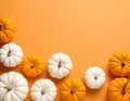 Flat lay composition with different ripe pumpkins on orange background Royalty Free Stock Photo