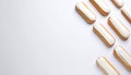 Ãclairs arranged neatly on matte soft white gradient background Royalty Free Stock Photo