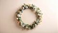 Small dried eucalyptus wreath on matte soft cream gradient background Royalty Free Stock Photo