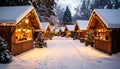 Wide Shot of Snowy Christmas Market with Wooden Huts and Lights Royalty Free Stock Photo