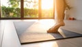 Minimal home yoga scene with sunlit mat and calm atmosphere Royalty Free Stock Photo