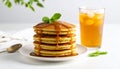 Three-quarter pancakes with caramel drizzle and iced green tea Royalty Free Stock Photo