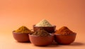 Small pile of barbecue spices in bowls on matte gradient background from muted orange to peach, minimal focus Royalty Free Stock Photo