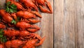 Delicious boiled crayfishes on wooden table, top view Royalty Free Stock Photo