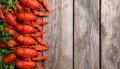 Delicious boiled crayfishes on wooden table, top view Royalty Free Stock Photo