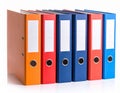 Many bright office folders isolated on white Royalty Free Stock Photo